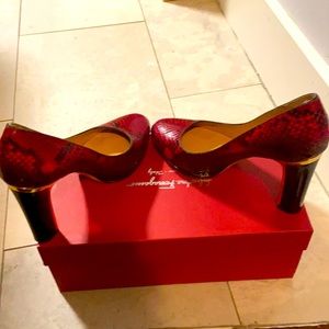 Red & black Python pumps with gold trimmed heel